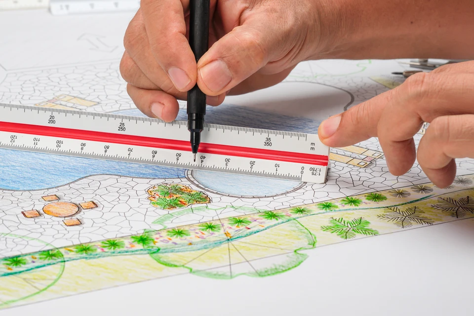 Jardin paysager moderne vu du dessus avec zones géométriques distinctes